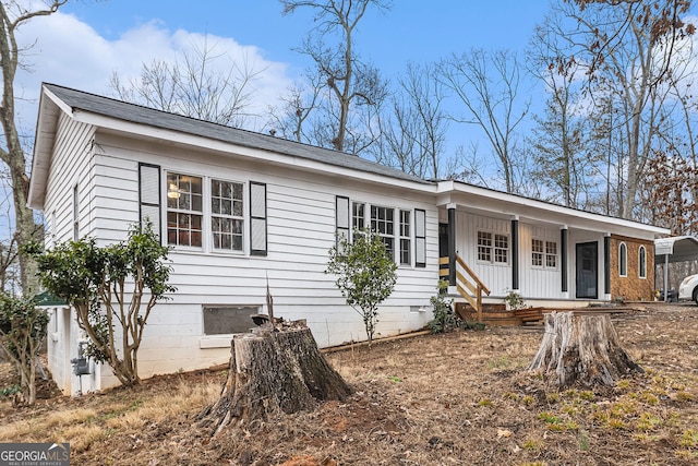 single story home with covered porch