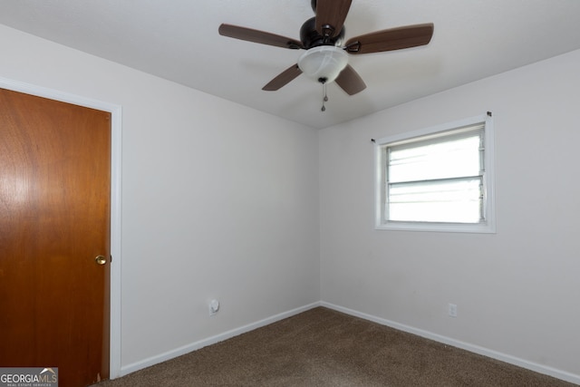 empty room with carpet flooring and ceiling fan