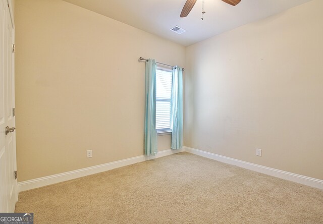 bathroom featuring vanity, tile patterned floors, and toilet