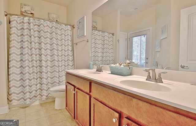 interior space featuring multiple windows, light colored carpet, ceiling fan, and a closet