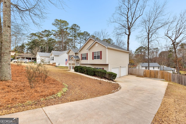 view of side of property with a garage