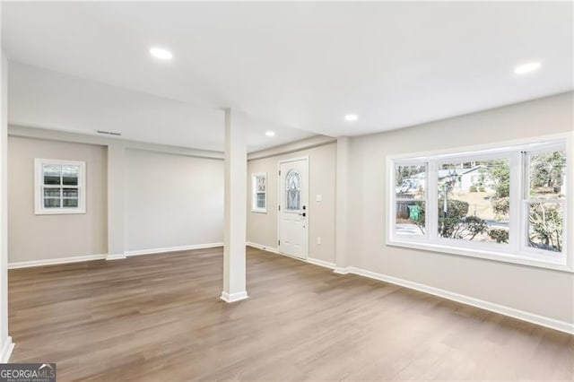 basement with wood-type flooring