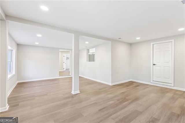 basement featuring light hardwood / wood-style flooring