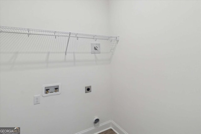 clothes washing area with washer hookup and electric dryer hookup