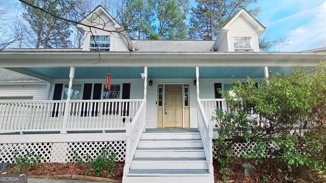 cape cod house with covered porch