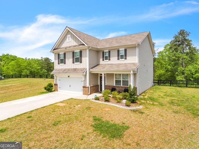 craftsman-style home with a front yard and a garage