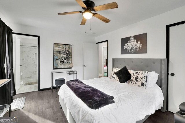 bedroom featuring dark hardwood / wood-style flooring, ceiling fan, and multiple windows