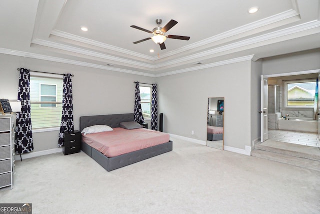 bedroom featuring carpet, ceiling fan, a raised ceiling, and crown molding