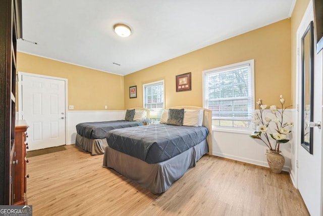 bedroom featuring light wood-type flooring