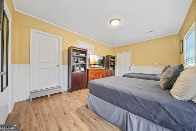 bedroom featuring light wood-type flooring