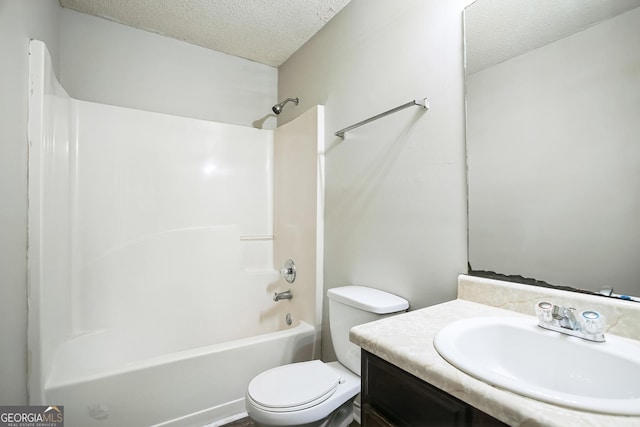 full bathroom featuring shower / bathtub combination, vanity, a textured ceiling, and toilet