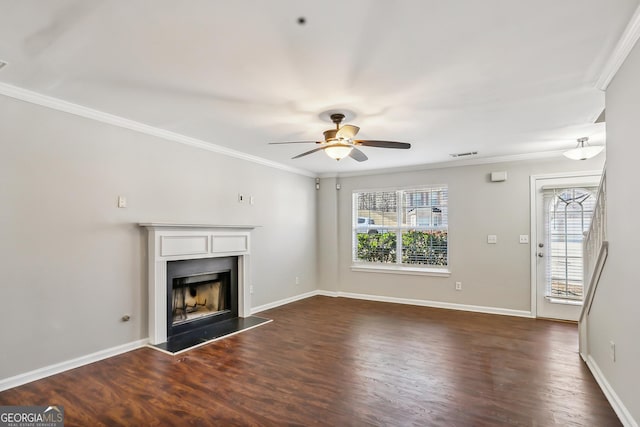 unfurnished living room with dark hardwood / wood-style floors, ceiling fan, and ornamental molding