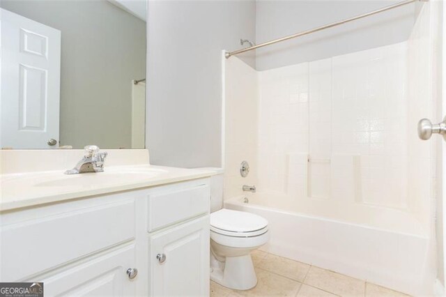 full bathroom featuring tile patterned flooring, vanity, toilet, and shower / tub combination