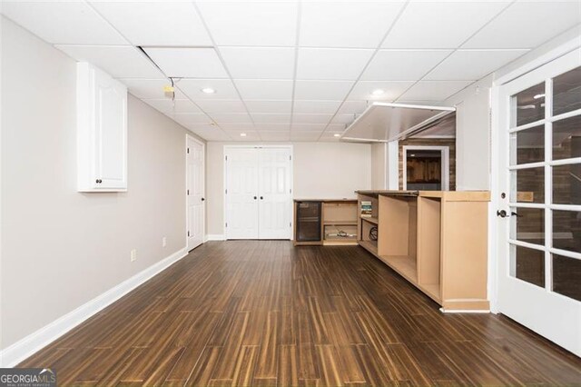 interior space with dark hardwood / wood-style floors