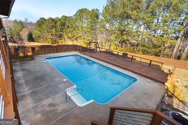 view of pool featuring a deck