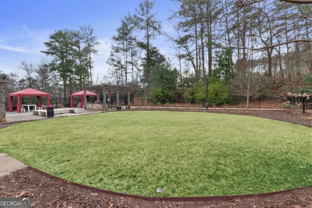 view of yard with a gazebo and a patio