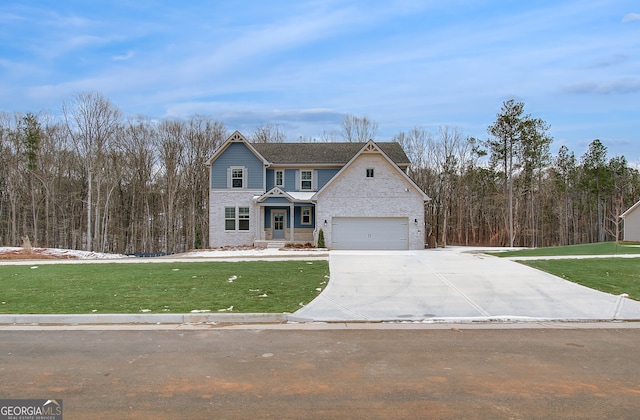 view of front property featuring a garage and a front lawn