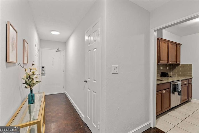 hallway with light tile patterned flooring