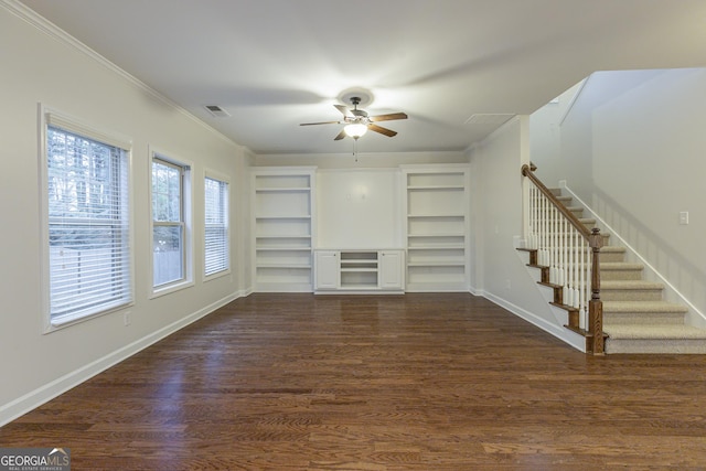 unfurnished living room featuring ceiling fan, dark hardwood / wood-style flooring, and crown molding