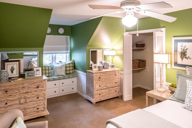 bedroom with carpet flooring, ceiling fan, and a closet