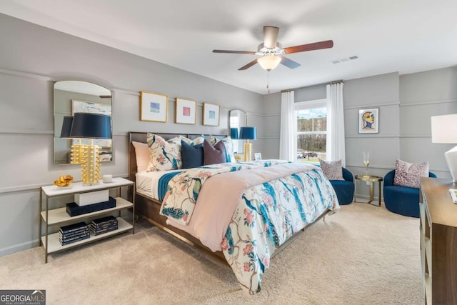 carpeted bedroom featuring ceiling fan