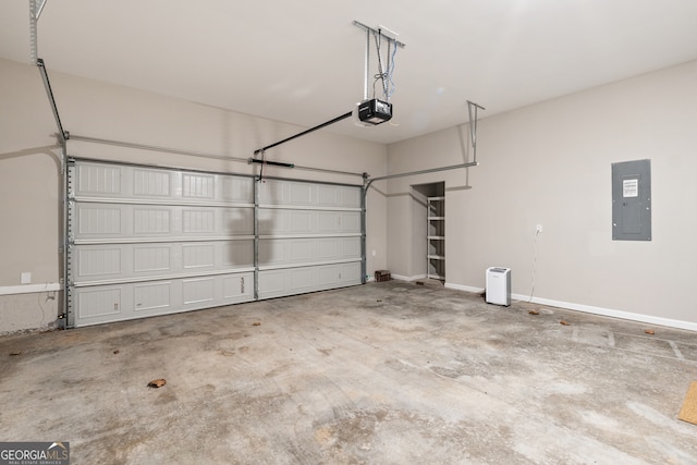 garage featuring electric panel and a garage door opener