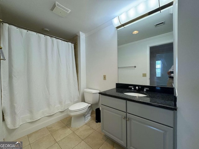 full bathroom featuring vanity, tile patterned floors, toilet, ornamental molding, and shower / tub combo