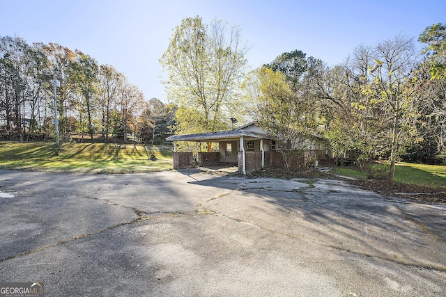 exterior space featuring a carport