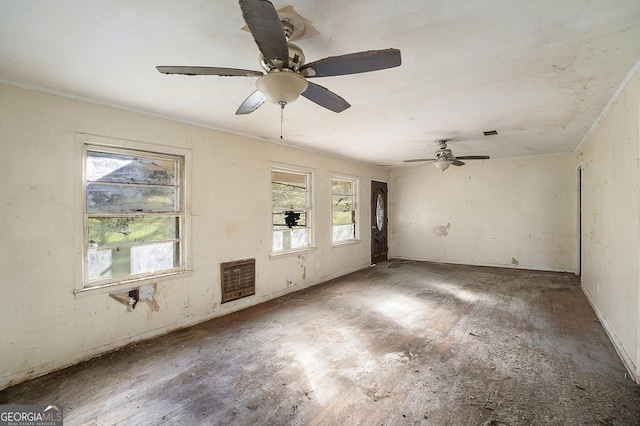 unfurnished room featuring ceiling fan