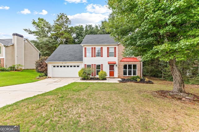 colonial house with a garage and a front lawn