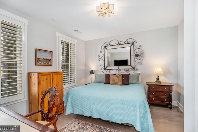 bedroom featuring light hardwood / wood-style flooring