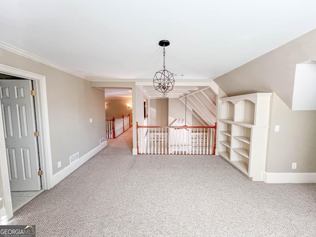 bonus room with built in features, carpet floors, and a notable chandelier