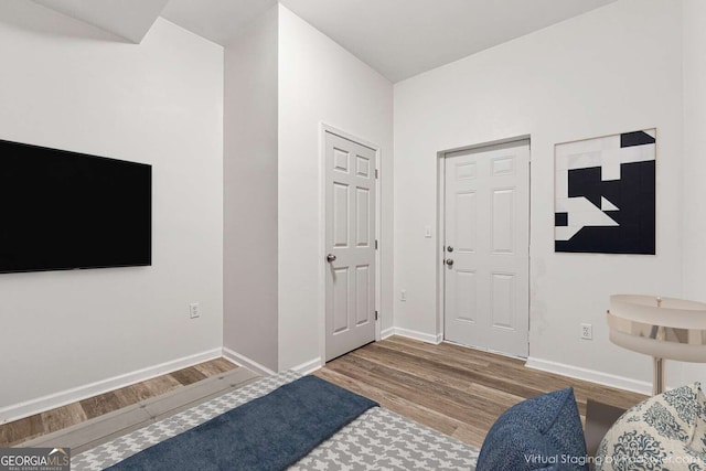 entrance foyer with hardwood / wood-style floors