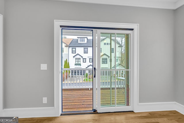 entryway with hardwood / wood-style flooring