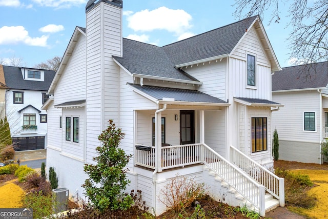 view of front of property featuring covered porch and central AC unit