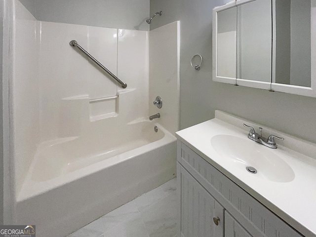 bathroom featuring vanity and shower / washtub combination