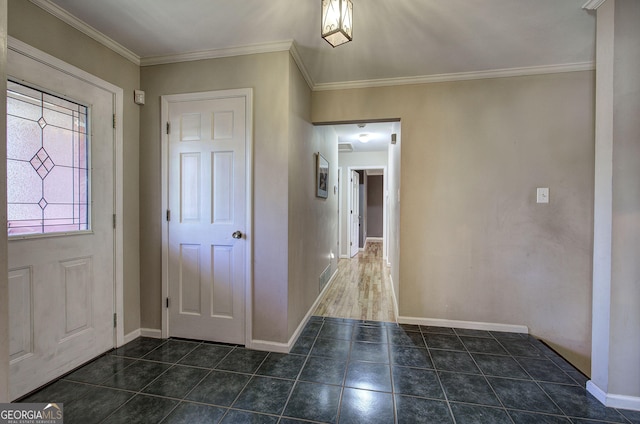 entryway with crown molding