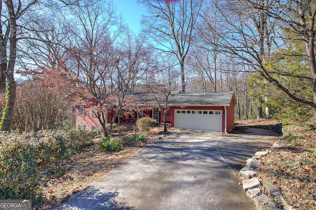view of front of house with driveway and a garage