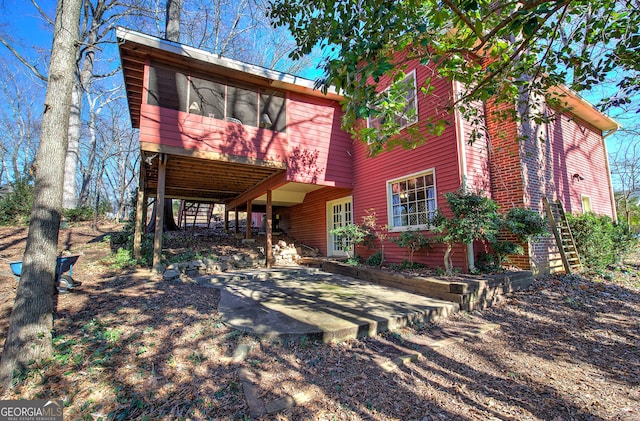 view of front of home featuring a wooden deck