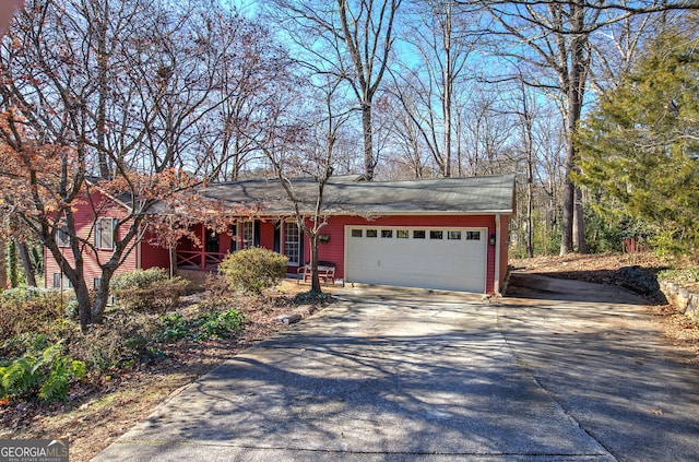 single story home with a garage