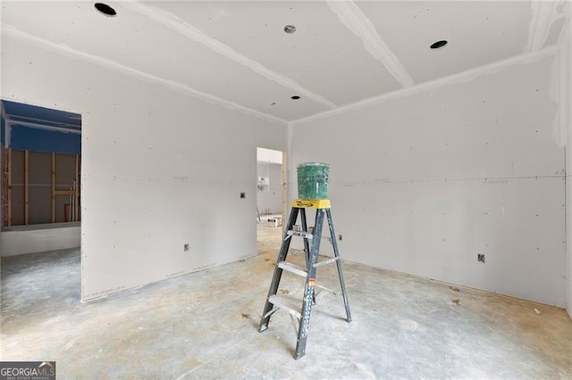 spare room with concrete flooring