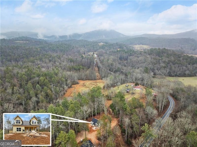 aerial view featuring a mountain view