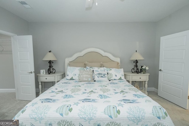 carpeted bedroom featuring ceiling fan