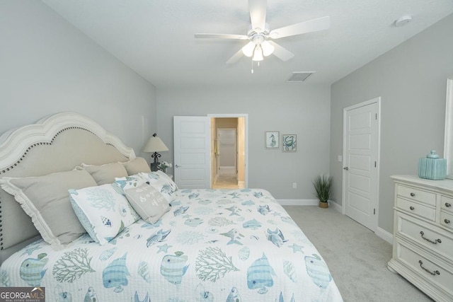 bedroom featuring light colored carpet and ceiling fan