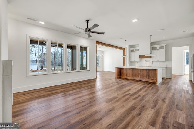 view of patio / terrace featuring french doors and a water view