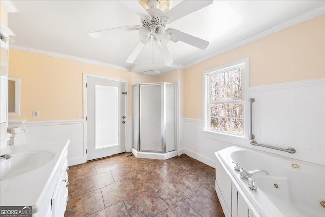 bathroom featuring ceiling fan, plus walk in shower, tile patterned flooring, crown molding, and vanity