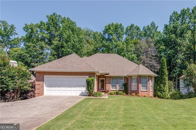 single story home featuring a front yard and a garage