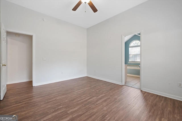 spare room with ceiling fan and hardwood / wood-style flooring