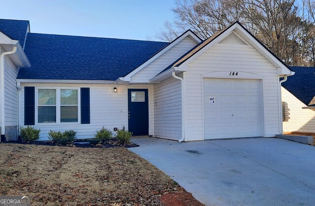 single story home with a garage