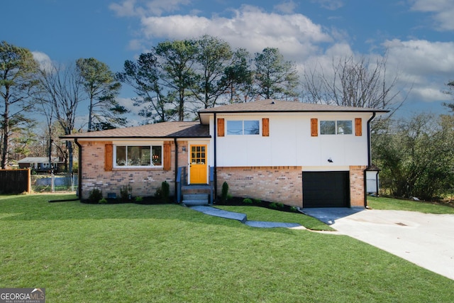 tri-level home featuring a front lawn and a garage